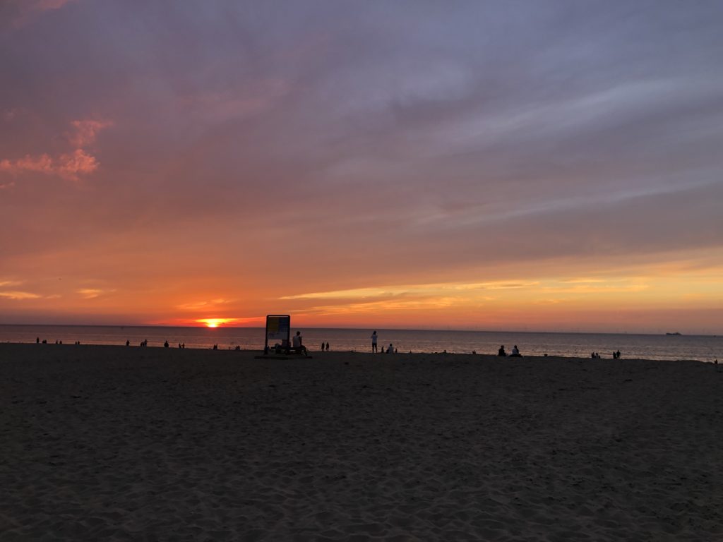 Photo of the sunset along a beach. Taken at The Hague, Netherlands.