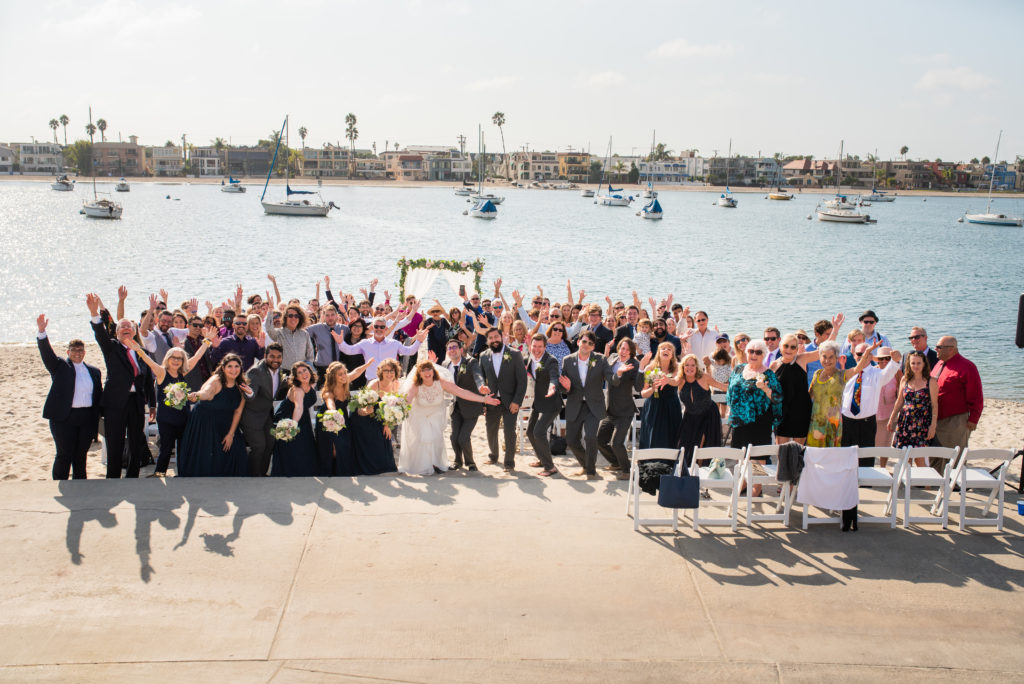 Large overhead group photo of C. and Ada's wedding party and guests.